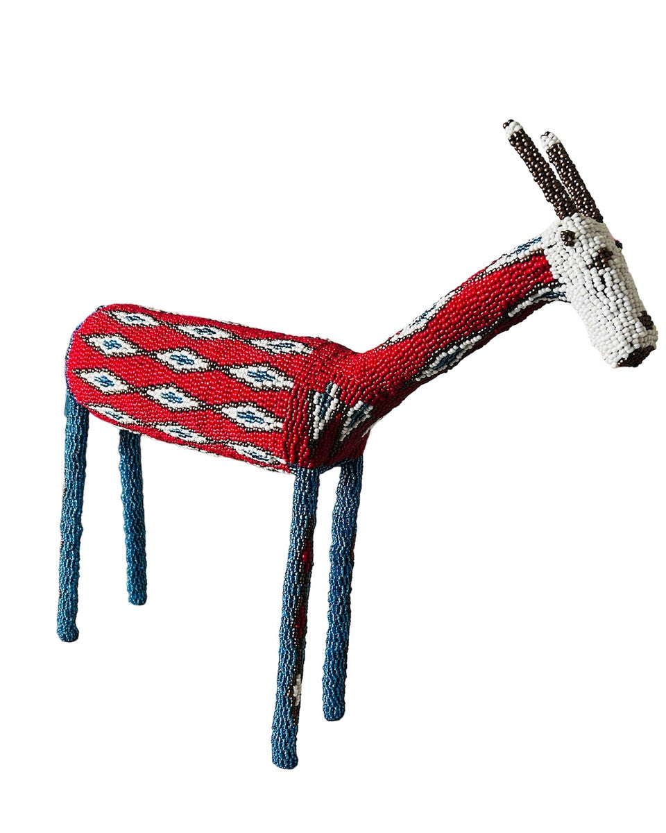 Handmade Beaded Springbok from Monkeybiz South Africa. Colors: deep rose, white, sky blue and copper.